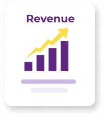 A man and woman seated at a couch looking at a laptop screen showing a revenue graph trending upward.
